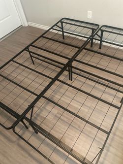 Two twin bed frames