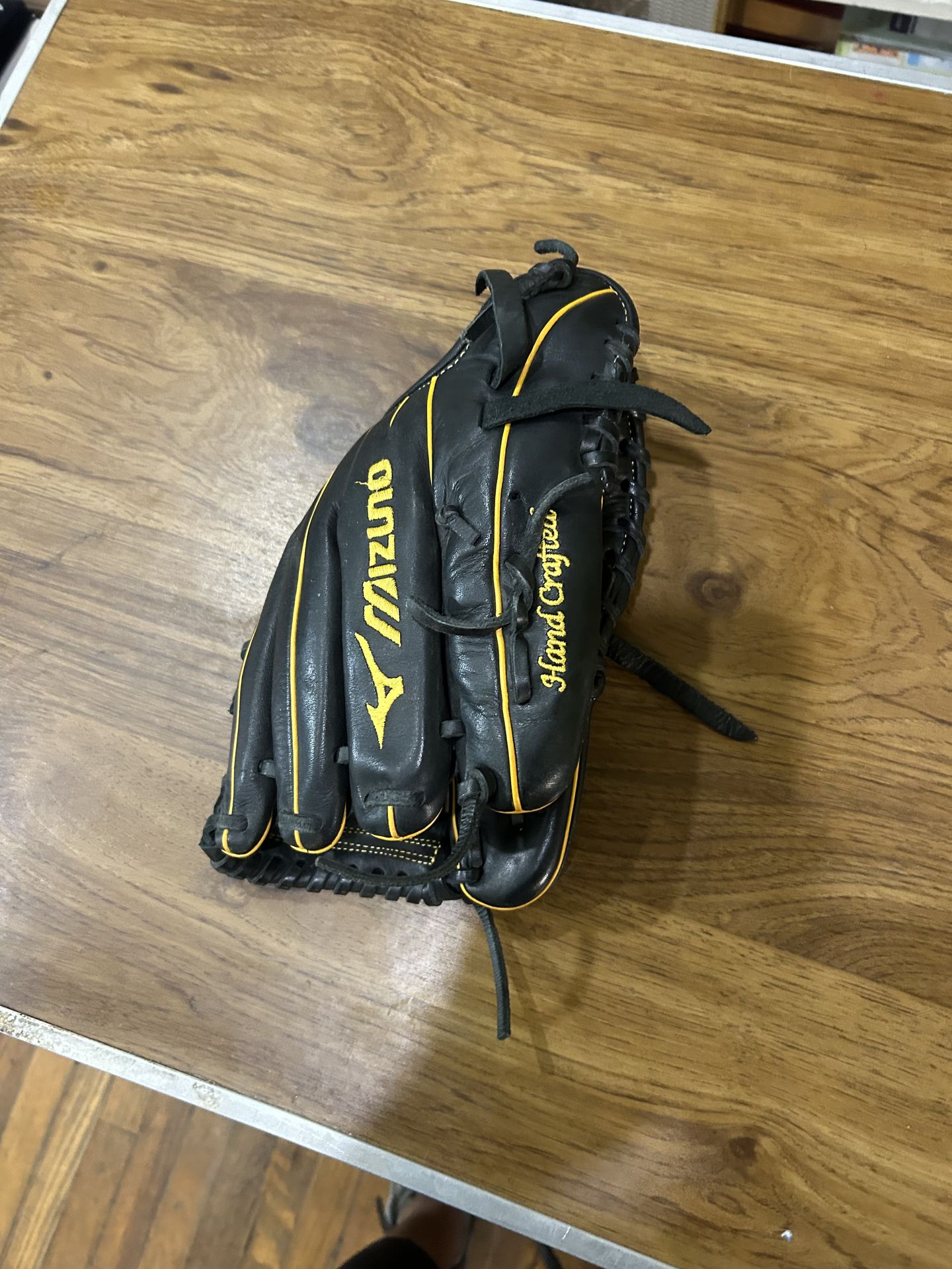 Damaged Handcrafted Mizuno Baseball Glove. Damaged but usable