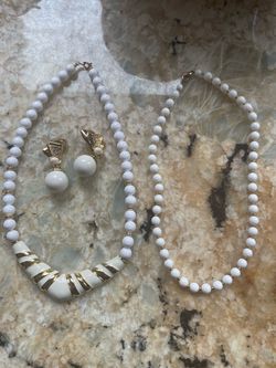2 white & gold beaded necklaces with clip on earrings