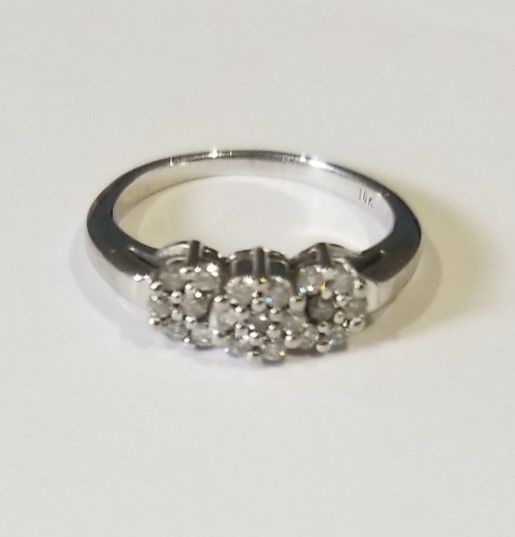 14k White Gold .25 ctw diamond ring Size 4