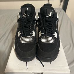 Air Jordan 4 Black and White Sneakers