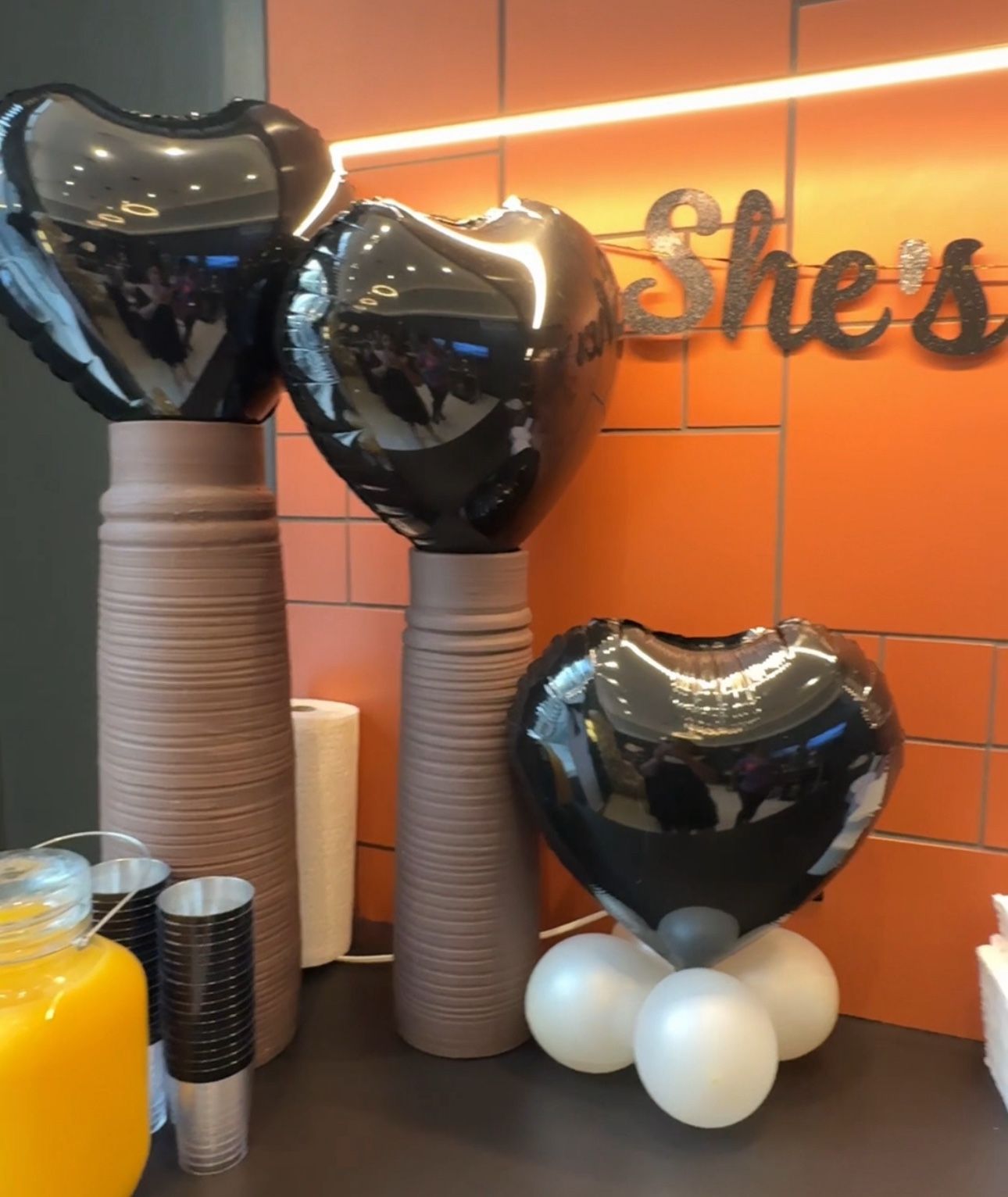 black heart-shaped balloons.