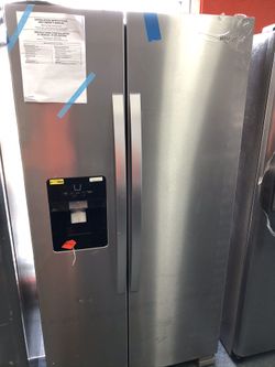 New scratch and dent whirlpool 25 cu ft stainless steel side by side fridge. 1 year warranty