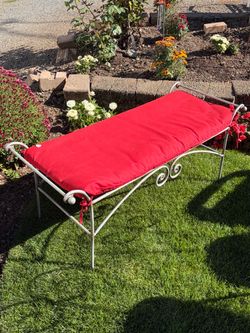 Wrought Iron Bench with Red Cushion