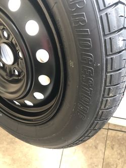Bridgestone tire P215/60R16