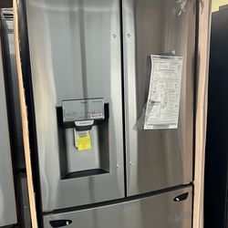 NEW IN BOX LG FRENCH STYLE STAINLESS STEEL REFRIGERATOR