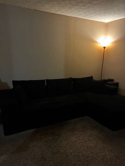Black Sectional Sofa with Back Cushions