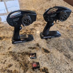 Two (2) Traxxas Transmitters / Remotes and 1 TQI receiver & 1 regular Traxxas Receiver 