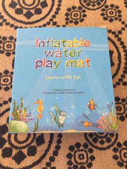 Inflatable water play mat and two floating books