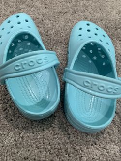 Teal Crocs