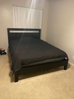 Ashley Black Bed Frame with Headboard