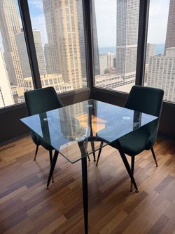 Glass Top Dining Table with 2 Green Chairs