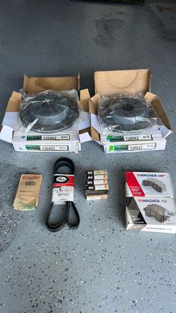 2004 dodge ram 1500. Brakes,rotors, 4xspark plugs,Belt