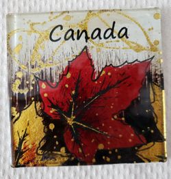 Two Sets of Canadian Maple Leaf Coasters