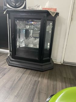 Black display cabinet glass door and beck mirror Excellent condition 36 long 36 tall 15 inches deep