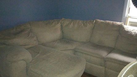 Lovely brown sectional with a reclining chair and a pull-out bed ask 650