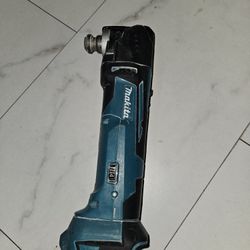 Makita multi Purpose Tool Battery And charger 