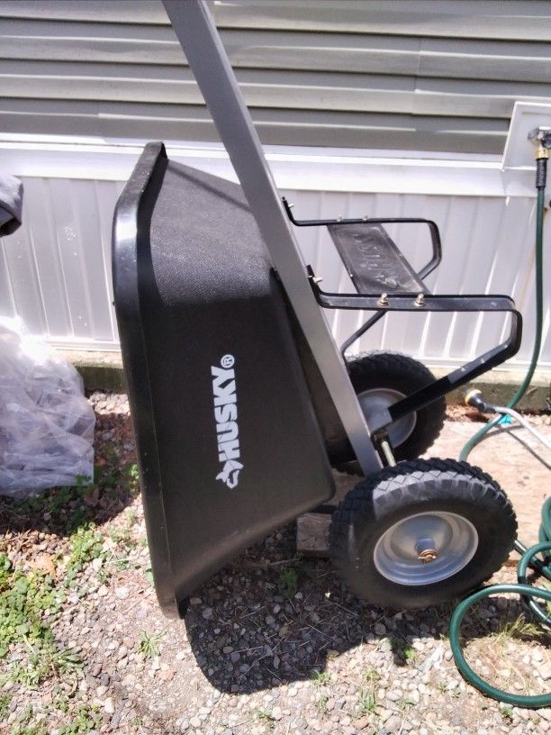 NEVER USED Husky 6cu. Ft. Dual Wheel Poly Wheelbarrow