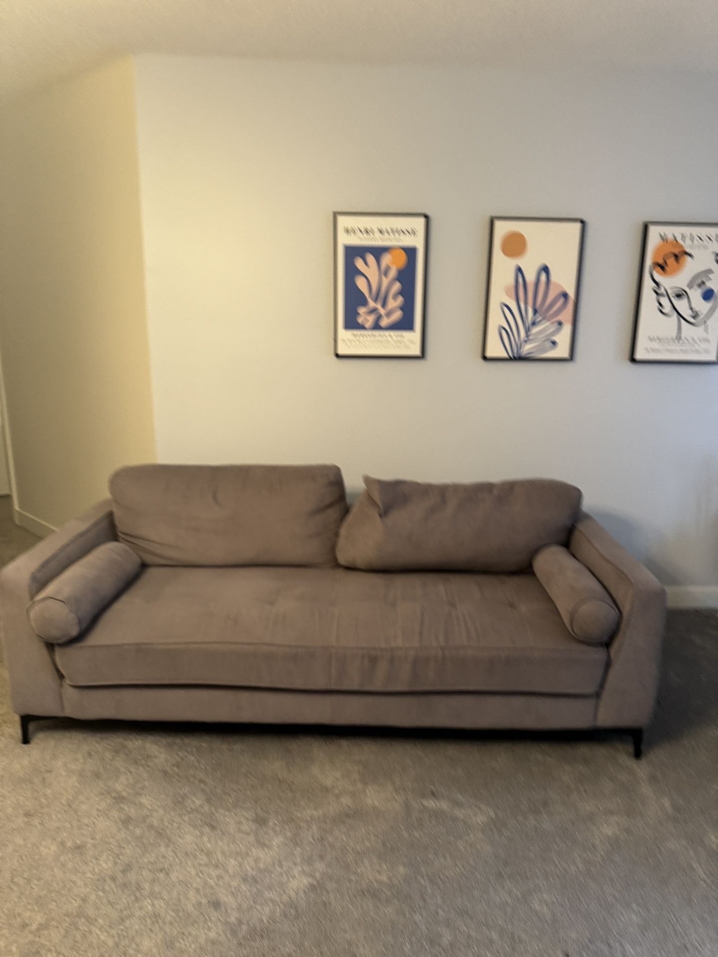 Light grey Cardi’s cloth couch