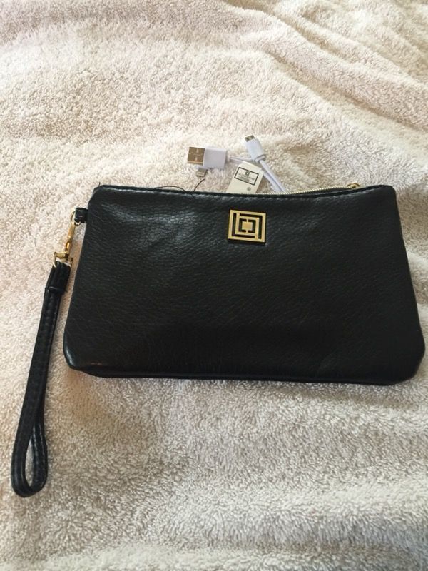 Wristlet with phone chargers attached.