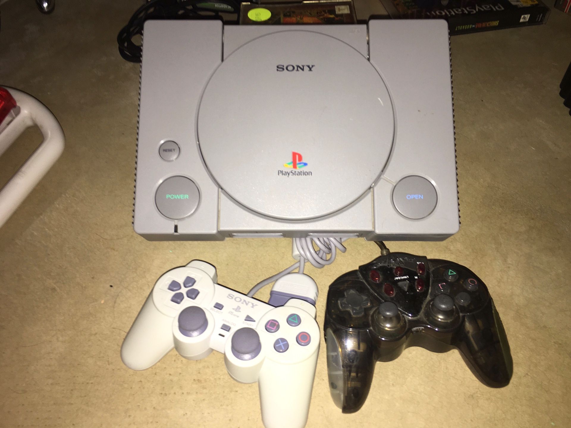 Sony playstation with 11 games and 2 controllers