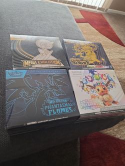 Etbs, phantasmal flames, mega evolution, surging sparks, and Prismatic