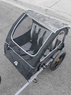 Bike trailer, holds two children like new condition