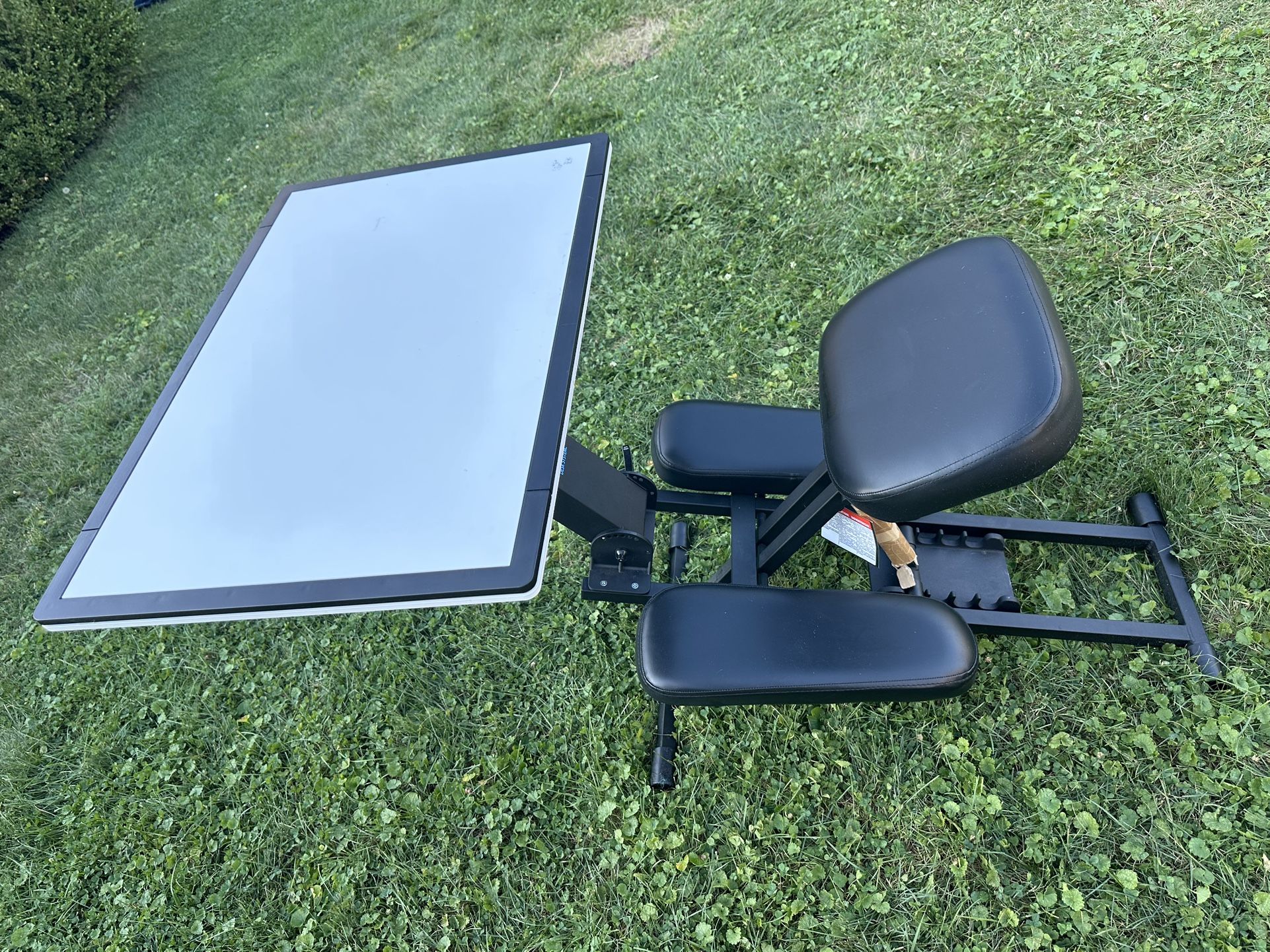 The Edge Desk System, an ergonomic adjustable kneeling desk. 