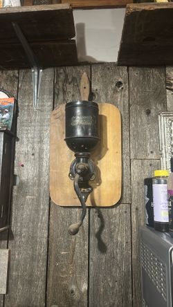 Antique wall mounted coffee grinder