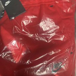 Red Nike Tech Joggers 