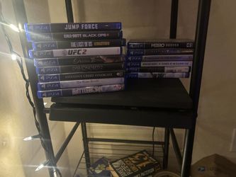 PS4 Slim with 15 games and controller