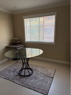 Glass top dining table