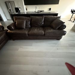 2—Genuine Leather Couches dark brown  Large Couch and one loveseat