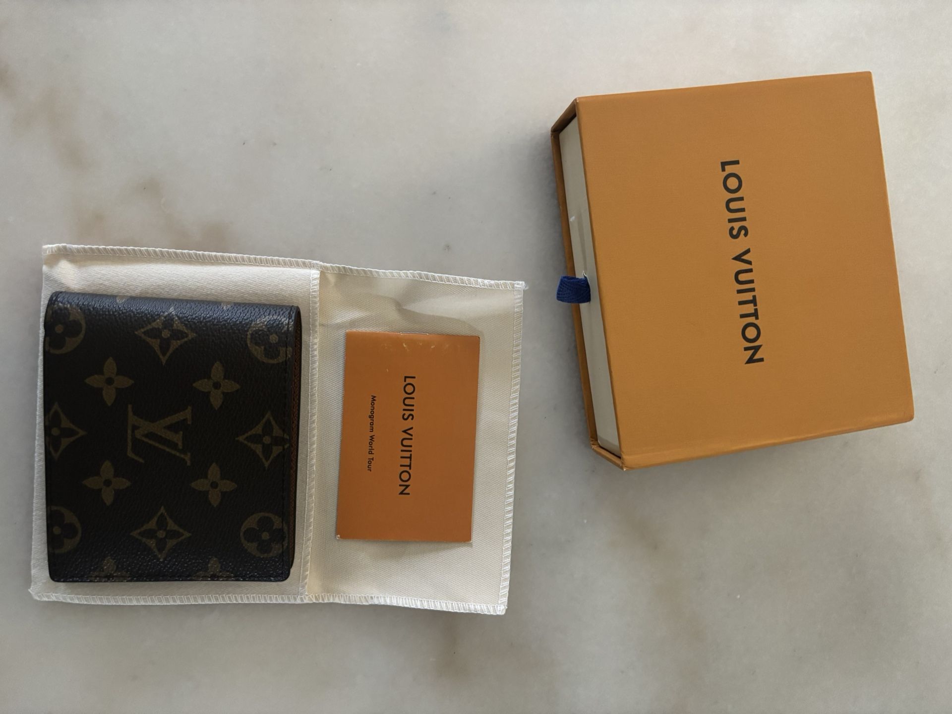 Louis Vuitton Men’s Wallet in Brown