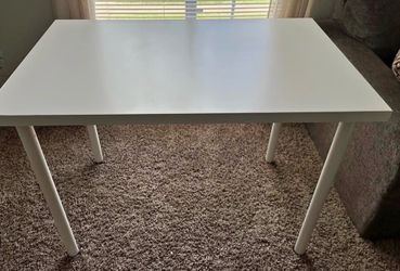 IKEA LINNMON white desk table in good used condition. Large 59” x 29.5” tabletop with 4 white legs. Clean, sturdy, and has plenty of workspace. Great