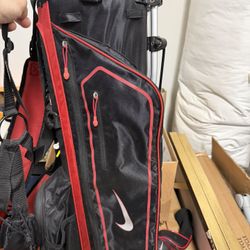 Golf clubs set with bag – includes mixed brands and accessories. Some clubs are Nike along with Moli