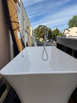 Stand alone Deep Soaking Tub with shower attachment.  $2000 new, asking $400