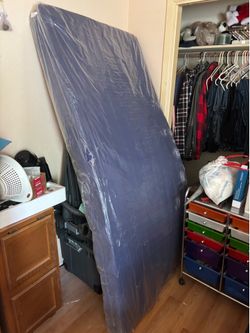 Unused hospital bed mattress