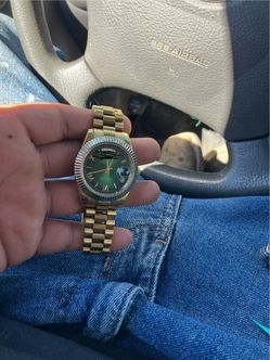Gold” crown “ watch