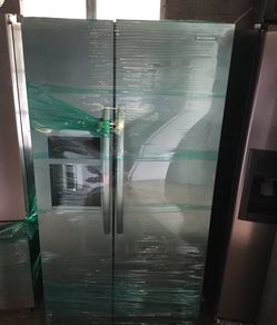 KitchenAid side by side stainless refrigerator/ 90 day warranty/ delivery and installation are available