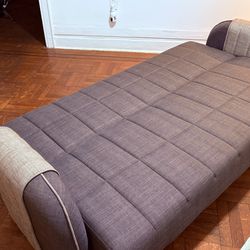 Couch that flattens w/ storage space New