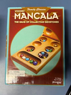 The Pressman Mancala Wooden Board Game is a family-themed board game designed for 2 players, suitable for ages 6 and above. The game is a complete set