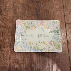 Paper Destiny glass dish 7"×5",  "live life in full bloom", surrounded by a pastel wildflower botanical border, good condition