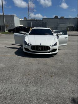 white Maserati Ghibli