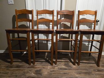 4 solid wood bar height chairs