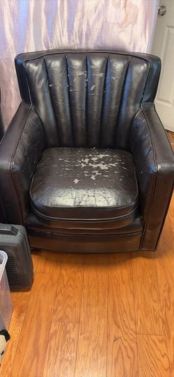2 Faux Leather chairs