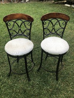 2 sillas de las que giran sólidas