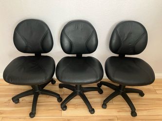 3 Leather Chairs with wheels