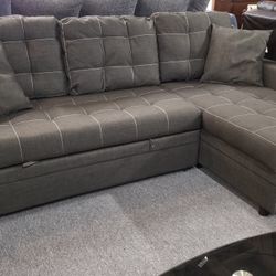 Brand New 86" x 57" Gray Reversible Pullout Sectional With Storage Chaise