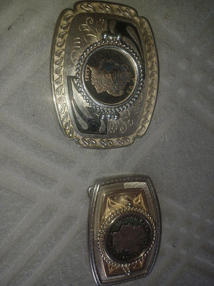Silver dollar cutouts In belt buckle